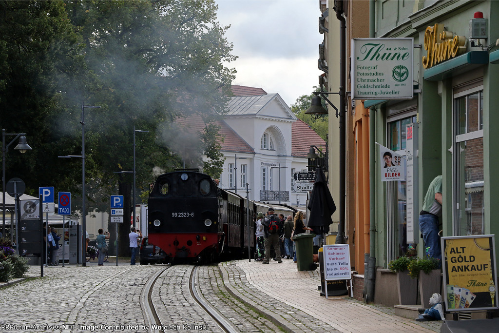 99 2323-6